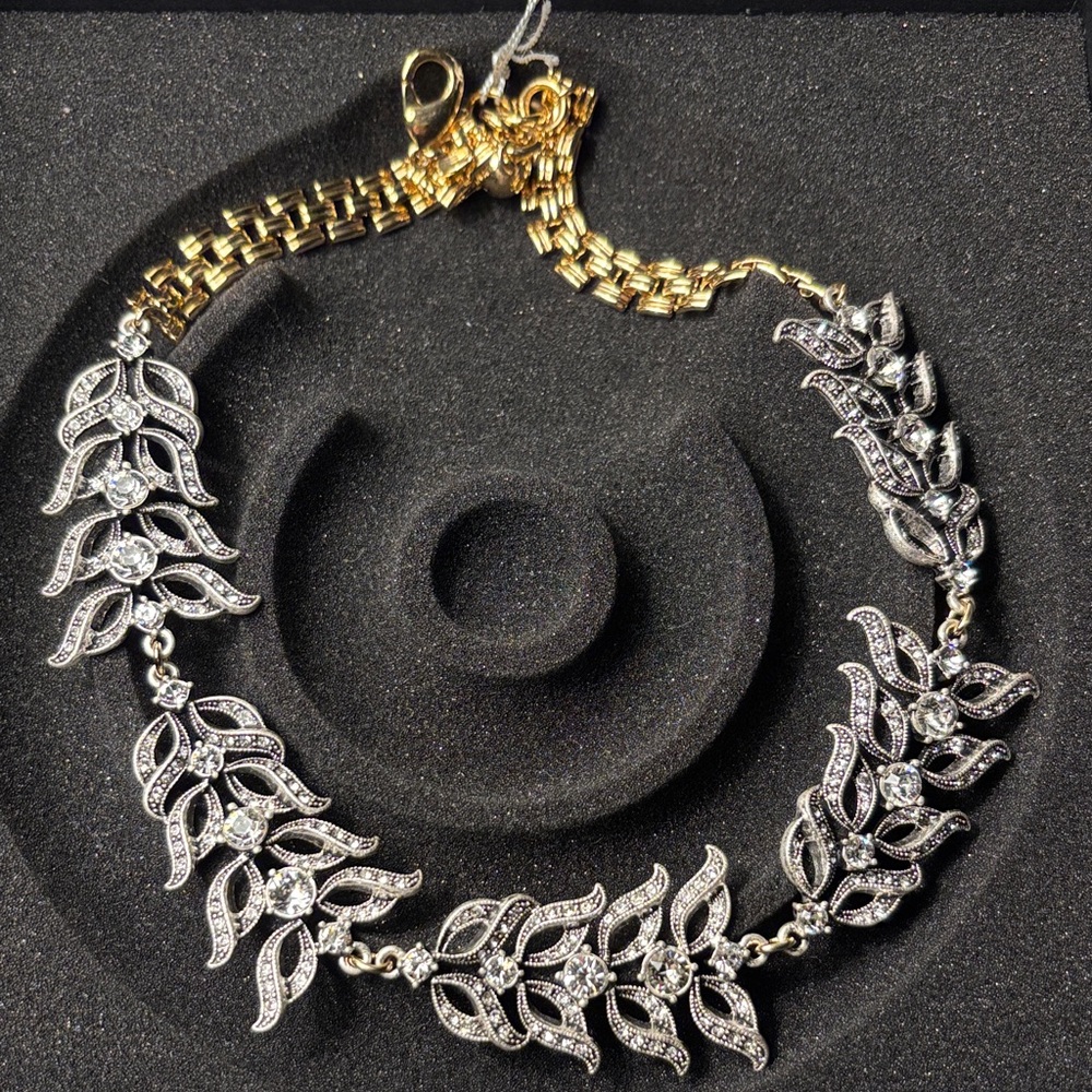 Authentic Frost brand Silver and Gold Leaf Necklace. NEW.